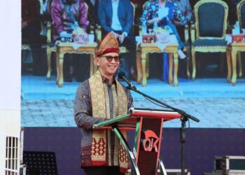 Ketua Dewan Komisioner OJK, Mahendra Siregar, pada Puncak Semarak Harvesting Gernas BBI-BBWI, di Lapangan DPRD Provinsi Sumsel, Palembang.