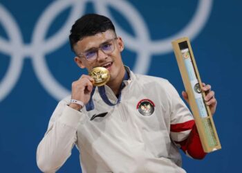 Lifter Rizki Juniansyah mempersembahkan medali emas kedua buat Tim Indonesia di Olimpiade Paris 2024.