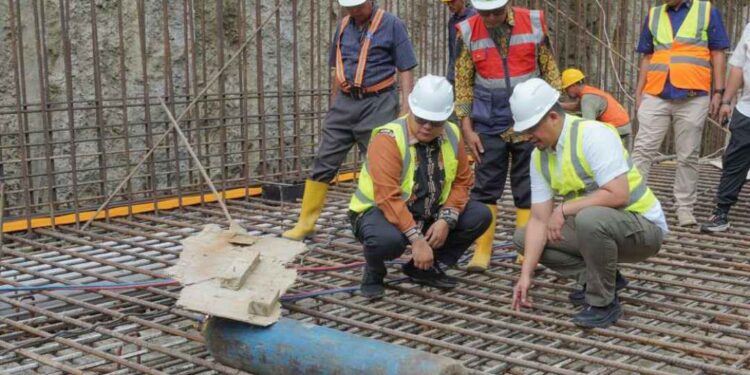 Progress pembangunan Overpass Jalan Stasiun, Medan.