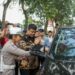 Opsen Pajak Berlaku, Pemko Medan Dapat 66% dari PKB 2 Wali Kota Medan, Bobby Nasution saat meninjau Operasi Gabungan Kepatuhan Bulanan Pajak Kendaraan Bermotor di Jalan Sisingamangaraja, Medan Kota, Kamis (30/1/2025).