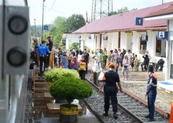 Penumpang kereta api.